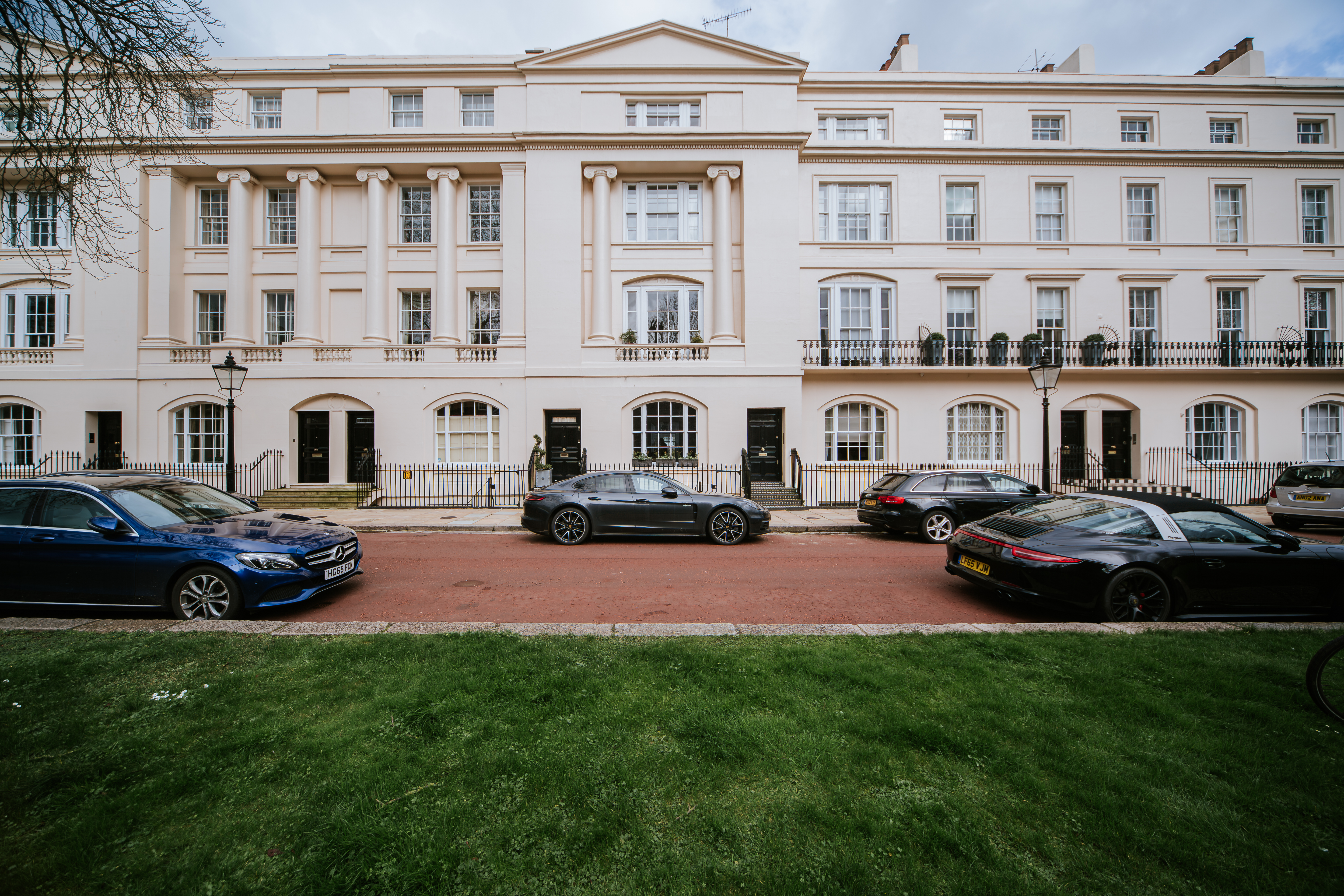 Wide residential exterior photographed in evening light